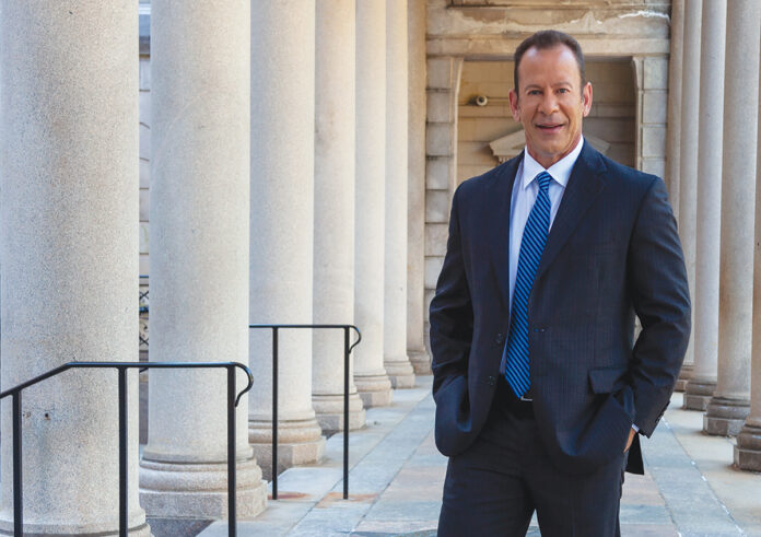 THE NAME GAME: ­Attorney Rob Levine, who branded himself the legal “Heavy Hitter,” says he is opposed to a requirement in Rhode Island that law firms use attorney’s names, not trade names, to identify firms. / COURTESY ANDREW FOGELL VUP MEDIA  