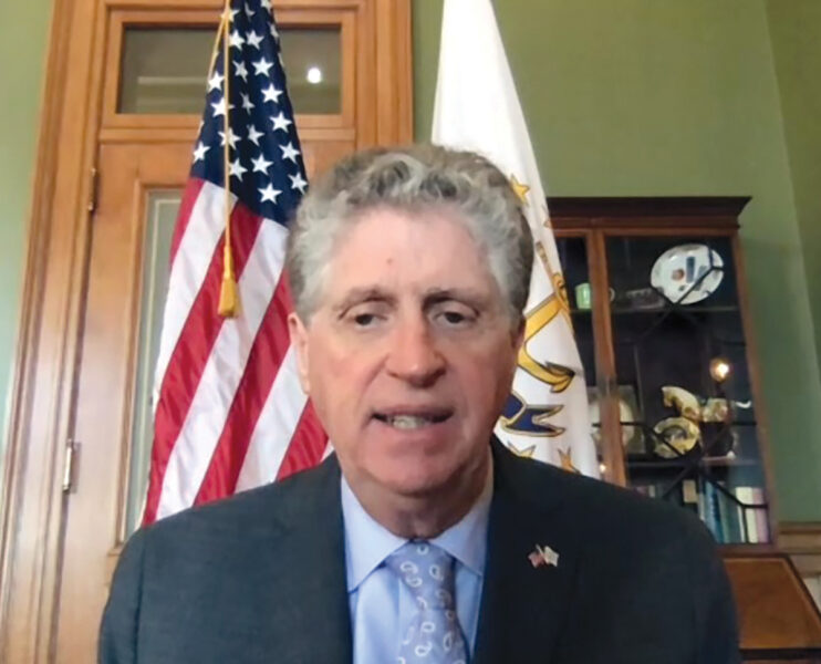 ON THE JOB: Gov. Daniel J. McKee speaks to staff on March 3, his first full day on the job.  / SCREENSHOT OF ZOOM MEETING