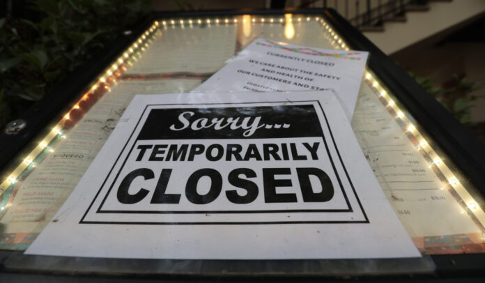 CONTINUING UNEMPLOYMENT CLAIMS totaled 79,245 in Rhode Island last week. / AP FILE PHOTO/ERIC GAY CONTINUING UNEMPLOYMENT CLAIMS totaled 79,245 in Rhode Island last week. / AP FILE PHOTO/ERIC GAY