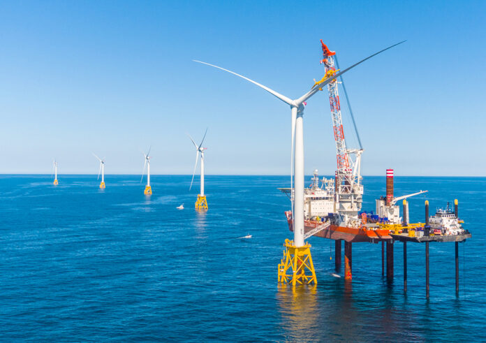 THE RHODE ISLAND HOUSE on Tuesday approved legislation requiring energy companies to hit 100% renewable electricity by 2033. Pictured is the Block Island Wind Farm, which will be one of the key sources of renewable energy needed to help the state meet this goal./ COURTESY ORSTED U.S. OFFSHORE WIND