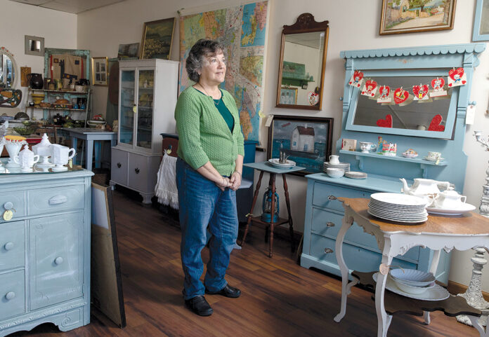 COLLECTOR: Lazy Dog Antiquities owner Karen Amann finds most of her wares in yard sales, online auctions and on Facebook Marketplace.  / PBN PHOTO/RUPERT WHITELEY