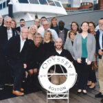 Custom Computer Specialists Inc. SAILING AWAY: Custom Computer Specialists Inc. employees about to embark on a recent cruise in Boston. / COURTESY CUSTOM COMPUTER SPECIALISTS INC.