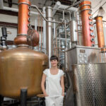 CREATIVE COMMUNITY: Manya Rubinstein, CEO of Industrious Spirit Co., a distillery in Providence, says she was drawn to the city and the closeness and collaborative nature among its artisans. / PBN PHOTO/MICHAEL SALERNO