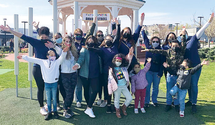 STROLLING ALONG: Marasco & Nesselbush LLP employees and their families participate in a Tomorrow Fund Walk in Cranston. / COURTESY MARASCO & NESSELBUSH LLP STROLLING ALONG: Marasco & Nesselbush LLP employees and their families participate in a Tomorrow Fund Walk in Cranston. / COURTESY MARASCO & NESSELBUSH LLP