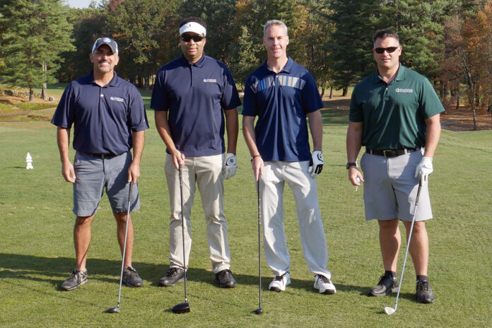 ON THE LINKS: Compass IT Compliance LLC employees compete in the company’s inaugural golf tournament. / COURTESY COMPASS IT COMPLIANCE LLC ON THE LINKS: Compass IT Compliance LLC employees compete in the company’s inaugural golf tournament. / COURTESY COMPASS IT COMPLIANCE LLC