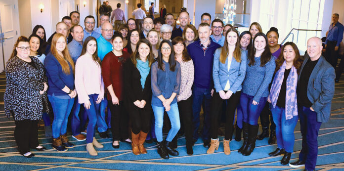 ENJOYING NEWPORT: The Brokers’ Service Marketing Group II LLC team gathers at its annual corporate meeting In Newport. / COURTESY BROKERS’ SERVICE MARKETING GROUP II LLC