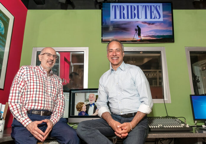 CHRONICLING LIVES: Joe Rocco, left, and Ted Canova are the founders of Tributes, which offers people the opportunity to share their life stories on video. / PBN PHOTO/MICHAEL SALERNO CHRONICLING LIVES: Joe Rocco, left, and Ted Canova are the founders of Tributes, which offers people the opportunity to share their life stories on video. / PBN PHOTO/MICHAEL SALERNO