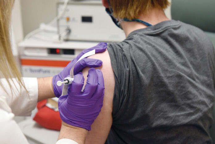 FINAL PUSH: The state recently gave nonprofits the final $380,000 in grants available from The RI Gives Vax Challenge to help boost COVID-19 vaccinations. / AP FILE PHOTO/TED S. WARREN