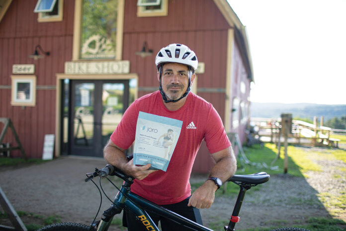 MUSCLE REPAIR: Rupert Whiteley, managing partner with Joro Protein LLC in Warren, holds a bag of the plant-based protein he created. / COURTESY JORO PROTEIN LLC MUSCLE REPAIR: Rupert Whiteley, managing partner with Joro Protein LLC in Warren, holds a bag of the plant-based protein he created. / COURTESY JORO PROTEIN LLC