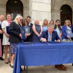 McKee signs pay equity, women’s health bills