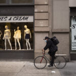 Business economists lower growth forecasts due to virus