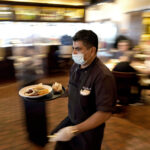 COMBINED COLLECTIONS of the local 1% meal and beverage and hotel taxes in Rhode Island increased 44.8% year over year in July. / AP FILE PHOTO/DAVID J. PHILLIP