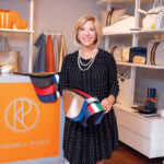 ITALIAN ­INSPIRATION: Kimberly Pucci, owner and creative director of Kimberly Pucci LLC in Newport, was inspired by the Tuscany region of Italy and the artisans and craftsmen she encountered while living there to launch her own business creating high-end jewelry and genuine leather products. / PBN PHOTO/DAVE HANSEN