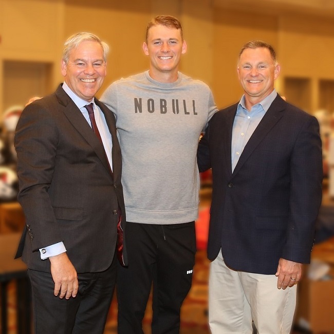 MAC JONES, New England Patriots quarterback, has been named the new spokesman for HarborOne Bank. Pictured from left are Joseph Casey, president of HarborOne Bank; Mac Jones; and David Tryder, senior vice president and chief marketing officer at HarborOne Bank. / COURTESY HARBORONE BANK