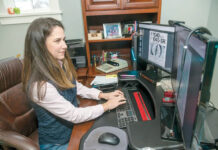 How many days a week are you, your work colleagues or staff required to be in the office? HERE TO STAY: Laura Yalanis, director of tax service for Kahn, Litwin, Renza & Co. Ltd., works in her home office in 2021. Some panelists believe remote work will become a permanent benefit offered by many local companies.
PBN FILE PHOTO/MICHAEL SALERNO