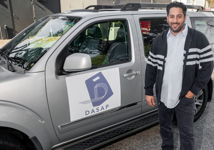 DRIVEN TO SUCCEED: Kenneth Zorabedian, a former valet driver, is the owner of DASAP, a Providence business that partners with local restaurants to deliver orders to customers, while also providing valet parking services at multiple venues throughout the city. / PBN PHOTO/MICHAEL SALERNO DRIVEN TO SUCCEED: Kenneth Zorabedian, a former valet driver, is the owner of DASAP, a Providence business that partners with local restaurants to deliver orders to customers, while also providing valet parking services at multiple venues throughout the city. / PBN PHOTO/MICHAEL SALERNO