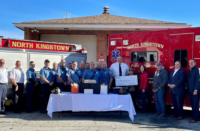 SEVEN FIRE DEPARTMENTS and the Bristol Ladies Auxiliary were recognized with Thanksgiving dinners by Cox Business, as part of its new First Responder Campaign. Each department also received $500 to donate to a charity of its choice. The North Kingstown Fire Department, pictured, chose the North Kingstown Food Pantry. / COURTESY NORTH KINGSTOWN FIRE DEPARTMENT