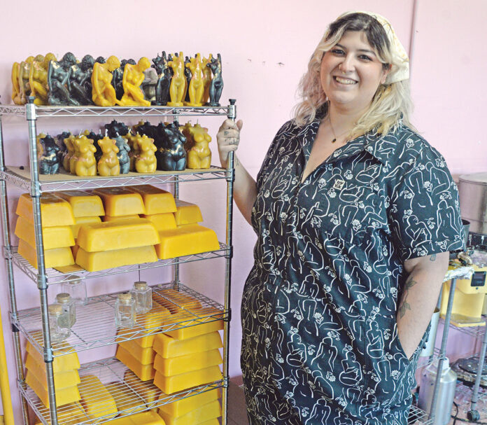 SKYROCKETING SUCCESS: Goddex Apothecary owner Kass Ferland Haroun, who launched the company in August 2020 selling candles and incense at local shops and farmers markets, now has a studio space in West Warwick and products are sold in stores nationwide and in Canada. / PBN PHOTO/ELIZABETH GRAHAM