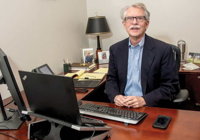 COST OF COVERAGE: Frank Doyle, AAA Northeast senior vice president of insurance, says the rising value of real estate has played a part in causing home insurance premiums to increase. / PBN PHOTO/MICHAEL SALERNO