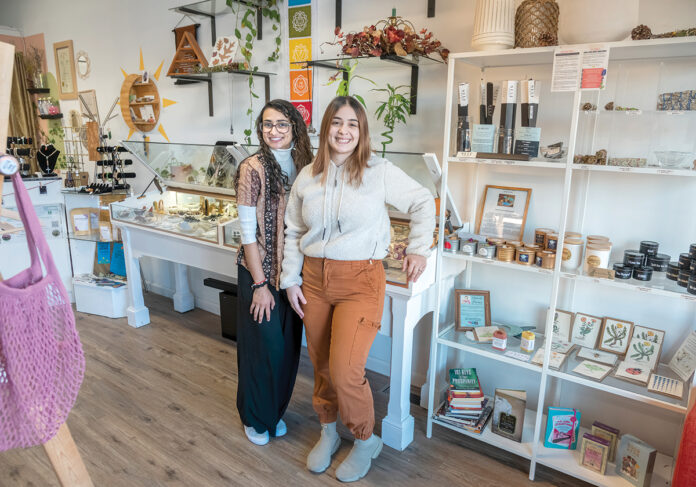 STRONGER TOGETHER: Ana Duque, left, and Karen Mejias at their new store called The Heal Room. The two Latina women have teamed up, using their past experiences as business owners to bring a zero-waste store and wellness bar to Pawtucket. PBN PHOTO/MICHAEL SALERNO