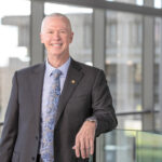 Mark Fuller was named chancellor of the University of Massachusetts Dartmouth in August 2021. He previously served as interim chancellor at UMass Dartmouth, as the vice chancellor for advancement at UMass Amherst and as dean of the Isenberg School of Management. / COURTESY SCOTT INDERMAUR