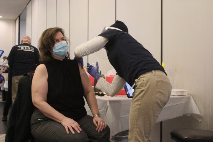 Vaccine shot (Credit James Bessette)