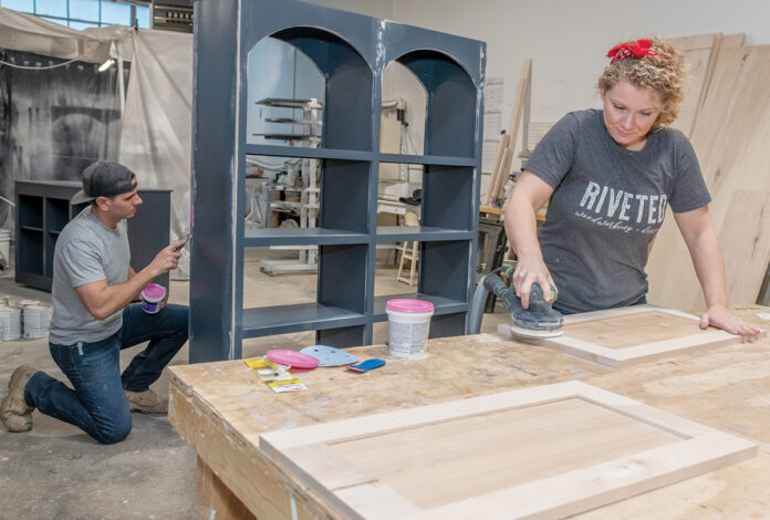 PERSONAL TOUCH: Althea Tower, owner of Riveted Woodworking & Design in Bristol, and her husband, Jason Tower, specialize in custom-made built-in structures. / PBN PHOTO/MICHAEL SALERNO