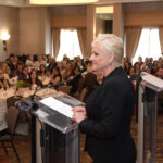 CHERYL MERCHANT, CEO of Taco Comfort Solutions, delivers her acceptance speech after receiving the 2022 Career Achiever award in the Providence Business News' 2022 Business Women Awards program. / PBN PHOTO/MIKE SKORSKI