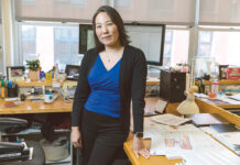 GIVING BACK: Whether training colleagues on new software programs or preparing high school students to pursue careers in architecture, engineering and construction, Tami Hughes, senior associate at DBVW Architects Inc. in Providence, relishes being a mentor.  / PBN PHOTO/RUPERT WHITELEY
