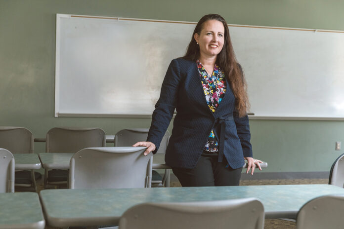 RIGHT TRACK: Christy Ashley, associate dean at the University of Rhode Island College of Business, says she feels URI is a place where she can make a difference.  / PBN PHOTO/RUPERT WHITELEY