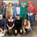 INTO CHARACTER: Carey, Richmond & Viking Insurance employees dress up for Halloween at its Middletown office.  COURTESY CAREY, RICHMOND & VIKING INSURANCE