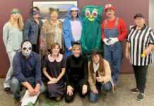 INTO CHARACTER: Carey, Richmond & Viking Insurance employees dress up for Halloween at its Middletown office.  COURTESY CAREY, RICHMOND & VIKING INSURANCE