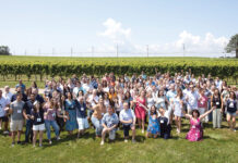 CBIZ & MHM SUMMER WINE: CBIZ & Mayer Hoffman McCann PC employees gather for a summer outing at Newport Vineyards. / COURTESY CBIZ & MAYER HOFFMAN MCCANN PC