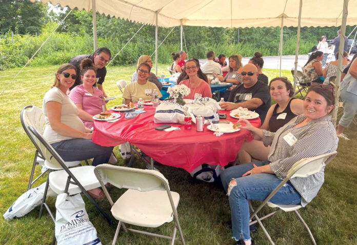 THE GREAT OUTDOORS: Employees from Dominion Diagnostics LLC gather last year for an event celebrating being named to Providence Business News’ Best Places to Work list.
COURTESY DOMINION DIAGNOSTICS LLC THE GREAT OUTDOORS: Employees from Dominion Diagnostics LLC gather last year for an event celebrating being named to Providence Business News’ Best Places to Work list.
COURTESY DOMINION DIAGNOSTICS LLC