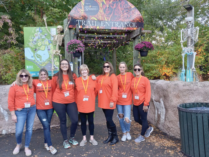 GIVING BACK: Duffy & Sweeney Ltd. employees volunteer at an event at Roger Williams Park Zoo in Providence. / COURTESY DUFFY & SWEENEY LTD. GIVING BACK: Duffy & Sweeney Ltd. employees volunteer at an event at Roger Williams Park Zoo in Providence. / COURTESY DUFFY & SWEENEY LTD.