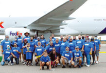 Automated Business Solutions FLYING HIGH: Automated Business Solutions Inc. gather at Rhode Island T.F. Green International Airport in Warwick to participate in a Jet Pull event to support multiple sclerosis awareness.
COURTESY AUTOMATED BUSINESS SOLUTIONS INC.