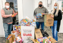 GIFT GIVING: RIKB Design Build team members raise donations for Toys for Tots of Rhode Island during the holiday season. / COURTESY RIKB DESIGN BUILD