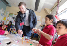 Rhode Island Foundation SPARKING IMAGINATION: Rhode Island Foundation Grant Programs Officer Ricky Bogert talks with students at an elementary school in Providence.
COURTESY RHODE ISLAND FOUNDATION