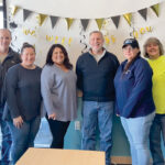 HAPPY TRAILS: The Town Dock employees hold a celebratory retirement party with the company’s finance team. / COURTESY THE TOWN DOCK