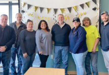 The Town Dock HAPPY TRAILS: The Town Dock employees hold a celebratory retirement party with the company’s finance team. / COURTESY THE TOWN DOCK