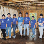 NEW HOME: The Washington Trust Co.’s mortgage team traded in their paperwork for hard hats and hammers, volunteering to help build a new home in partnership with South County Habitat for Humanity. / COURTESY THE WASHINGTON TRUST CO.