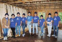 The Washington Trust Co. NEW HOME: The Washington Trust Co.’s mortgage team traded in their paperwork for hard hats and hammers, volunteering to help build a new home in partnership with South County Habitat for Humanity. / COURTESY THE WASHINGTON TRUST CO.
