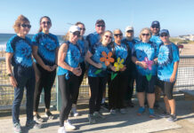 Westerly Community Credit Union WALKING FOR A CAUSE: Westerly Community Credit Union employees participate in a walk to support Alzheimer’s disease awareness. / COURTESY WESTERLY COMMUNITY CREDIT UNION