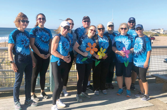WALKING FOR A CAUSE: Westerly Community Credit Union employees participate in a walk to support Alzheimer’s disease awareness. / COURTESY WESTERLY COMMUNITY CREDIT UNION