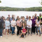 CAMPING OUT: Big Brothers Big Sisters of Rhode Island employees last year attend a family day celebration event at Camp Meehan in North Providence. / COURTESY BIG BROTHERS BIG SISTERS OF RHODE ISLAND