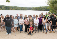 Big Brothers Big Sisters of Rhode Island CAMPING OUT: Big Brothers Big Sisters of Rhode Island employees last year attend a family day celebration event at Camp Meehan in North Providence. / COURTESY BIG BROTHERS BIG SISTERS OF RHODE ISLAND