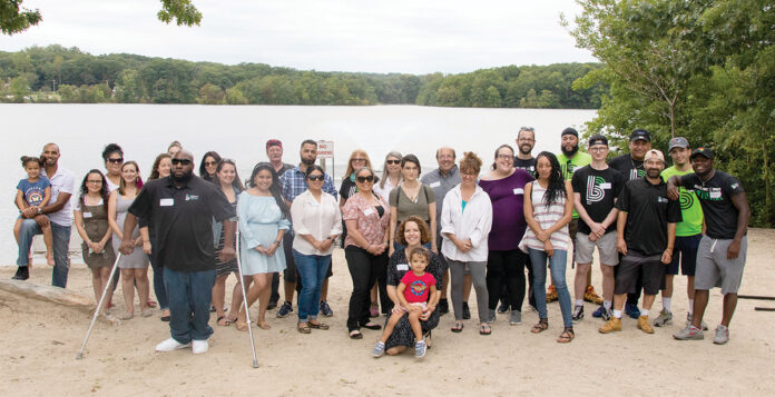 CAMPING OUT: Big Brothers Big Sisters of Rhode Island employees last year attend a family day celebration event at Camp Meehan in North Providence. / COURTESY BIG BROTHERS BIG SISTERS OF RHODE ISLAND CAMPING OUT: Big Brothers Big Sisters of Rhode Island employees last year attend a family day celebration event at Camp Meehan in North Providence. / COURTESY BIG BROTHERS BIG SISTERS OF RHODE ISLAND