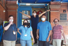 Children’s Friend and Service TIDY TASK: Staffers from Children’s Friend and Service help clean at the Berkshire Place Nursing and Rehabilitation Center in Providence. / COURTESY CHILDREN’S FRIEND AND SERVICE