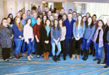 ENJOYING NEWPORT: The Brokers’ Service Marketing Group II LLC team gathers at its annual corporate meeting in Newport. / COURTESY BROKERS’ SERVICE MARKETING GROUP II LLC
