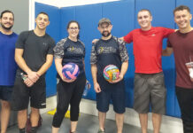 MATCH POINT: DiSanto, Priest & Co. staff members gather to participate in a local volleyball tournament. / COURTESY DISANTO, PRIEST & CO.